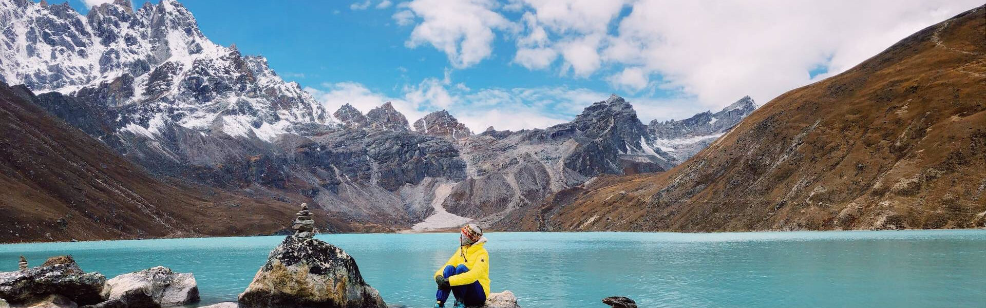 "Scenic Gokyo Lake Trek amidst Himalayan Majesty: Journey through Everest Region's Pristine Lakes and Towering Peaks"